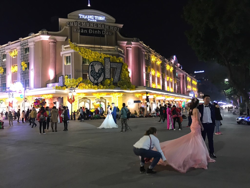 Tet decorations and wedding photos on the streets of Hanoi