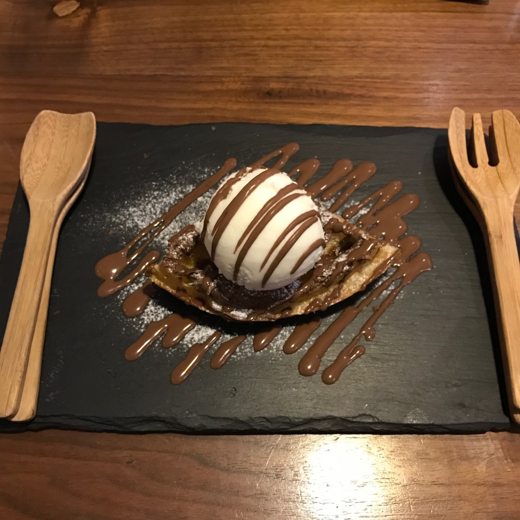 Classic waffle with Nutella and chocolate drizzle and coconut ice cream @ Wanna Waffle