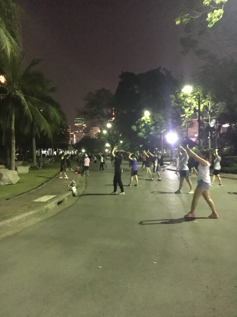 Outdoor fitness class @ Lumphini Park.